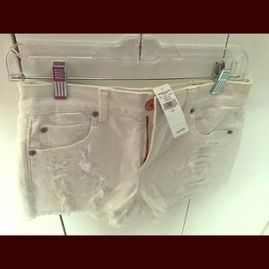 American Eagle Distressed white jean shorts